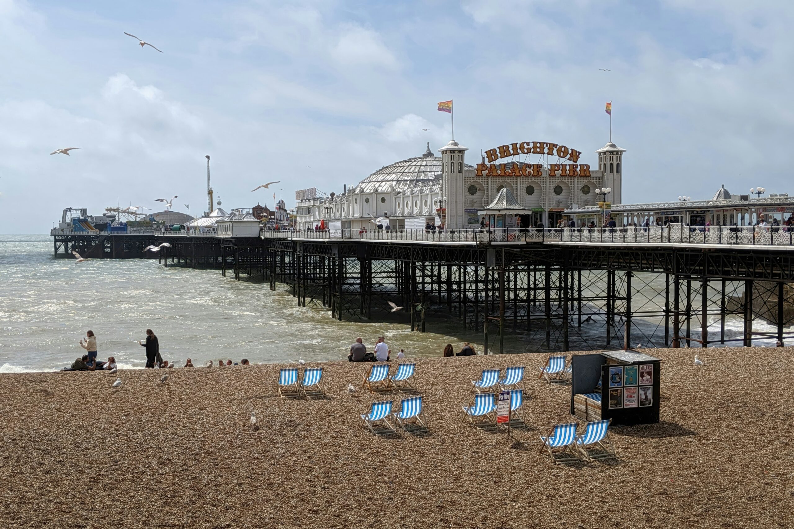 Trips and Tours seaside family holiday deal card showing a UK beach destination suitable f