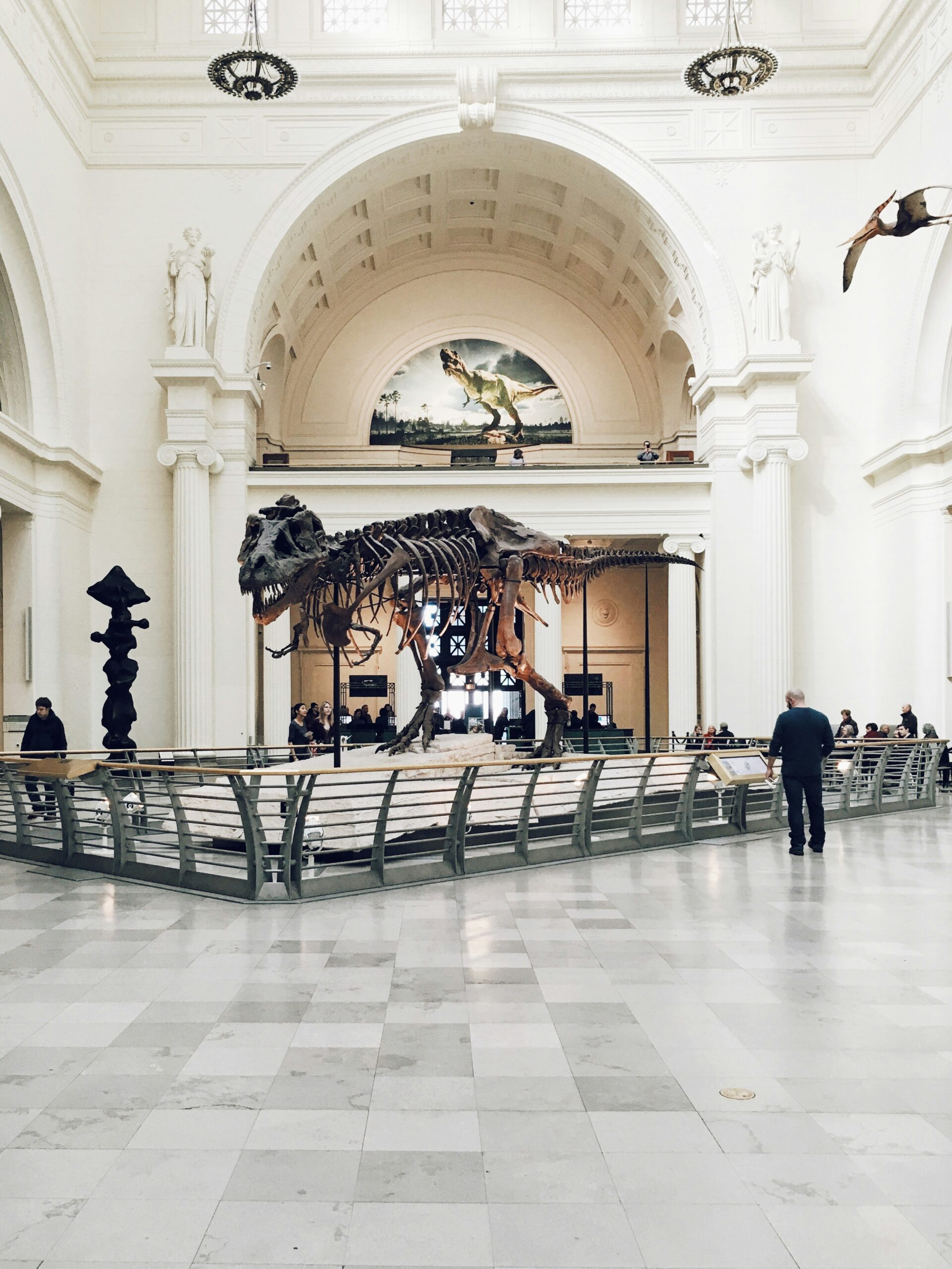 Image of a UK family city break with parents and children outside a museum or landmark, ho