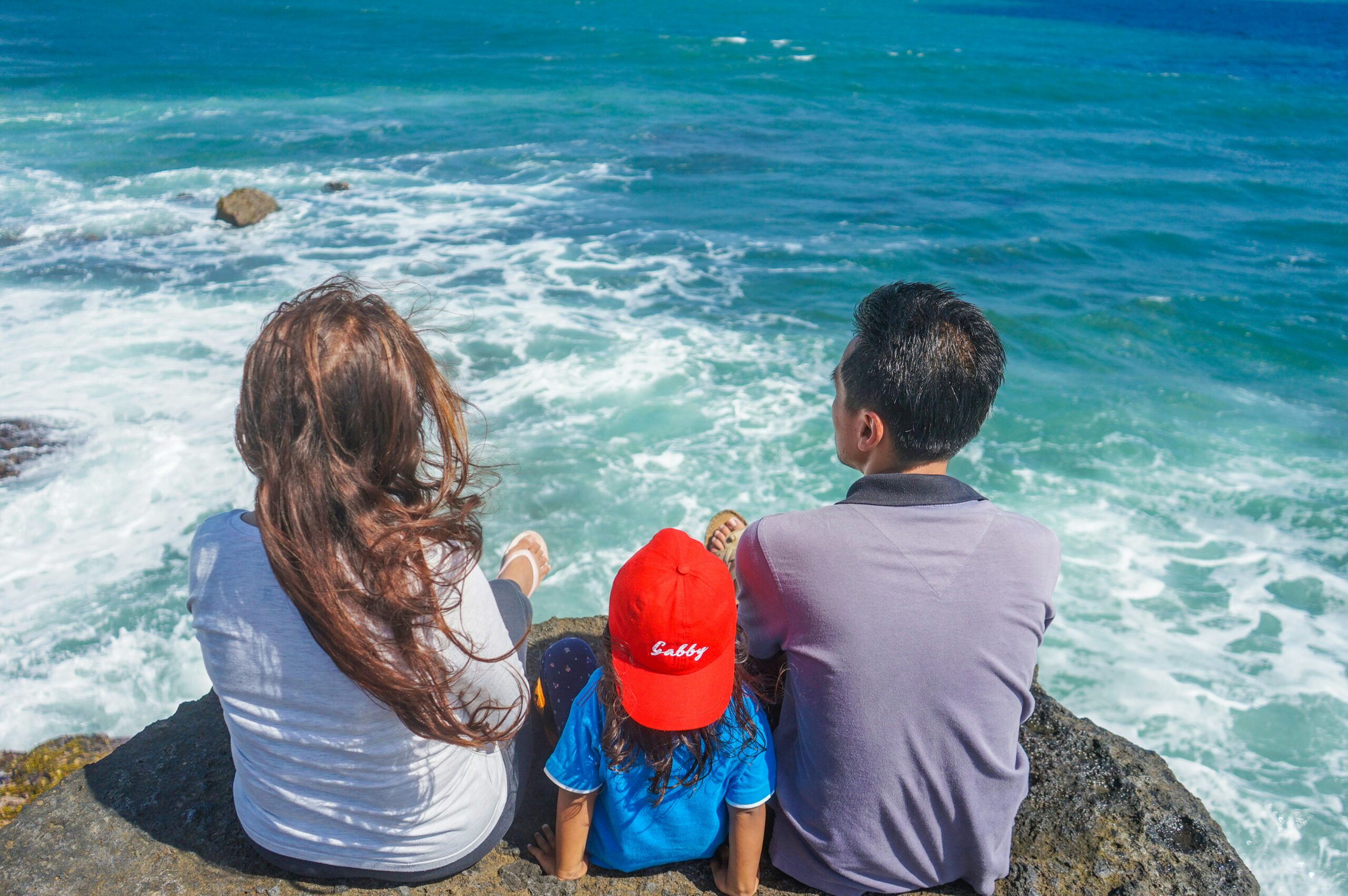 Editorial thumbnail for Trips and Tours article about summer family holidays showing child